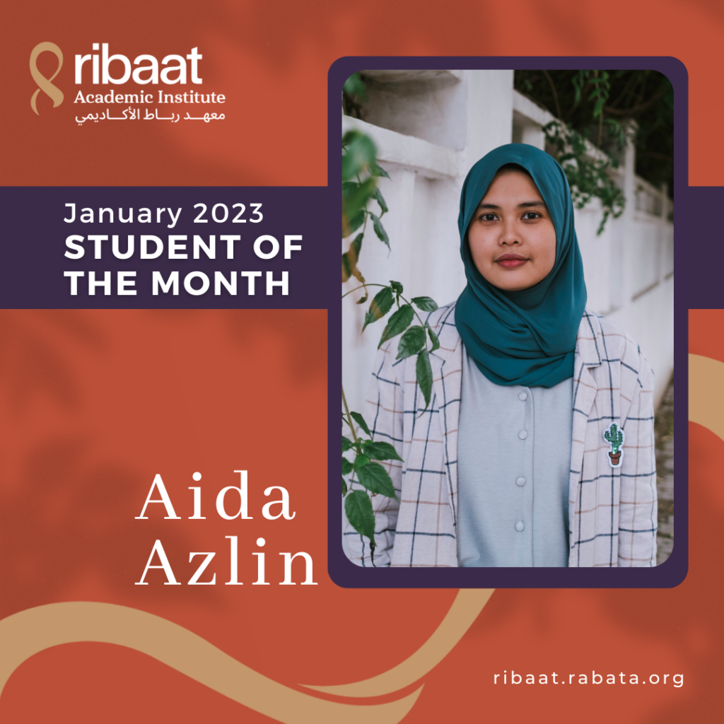 Ribaat Academic Institute January 2023 Student of The Month Aida Azlin (Picture of Muslim student wearing green scarf with cactus pin on her blazer pocket)